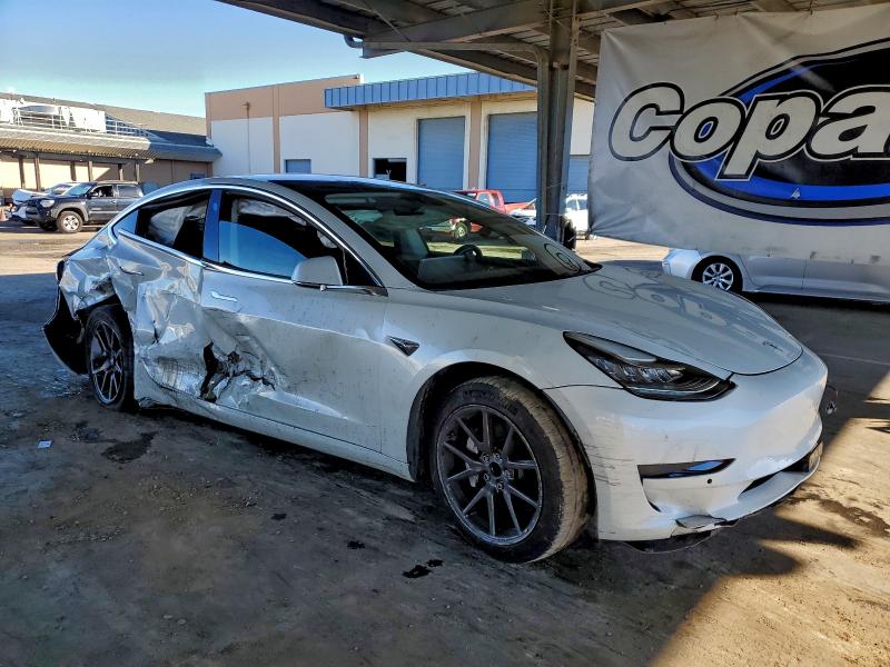 Photo 4 from auction – 2018 TESLA MODEL 3 with VIN 5YJ3E1EA7JF020559