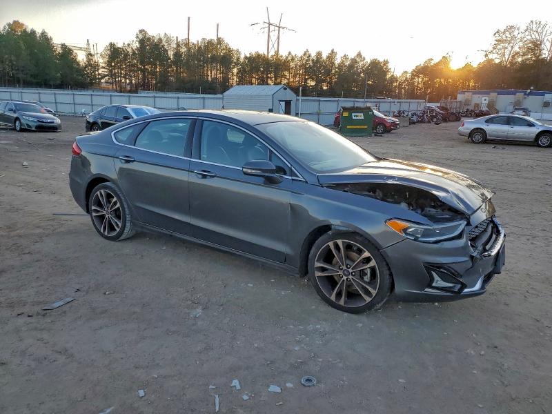 Photo 4 from auction – 2019 FORD FUSION TIT with VIN 3FA6P0D98KR105179