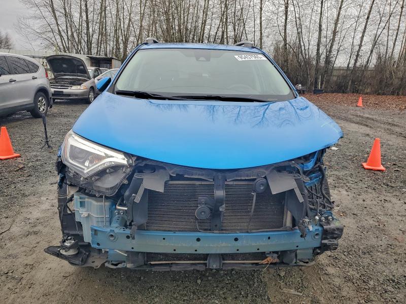 Photo 5 from auction – 2018 TOYOTA RAV4 LIMIT with VIN 2T3DFREV9JW768288