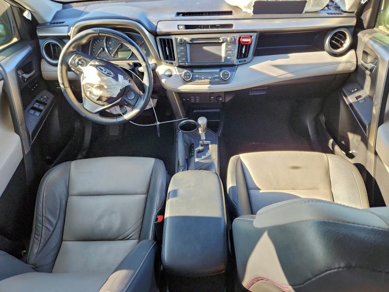 Photo 8 from auction – 2014 TOYOTA RAV4 with VIN JTMDFREV4ED095493