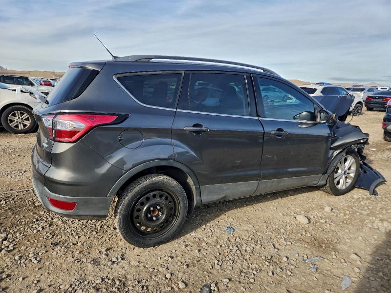 Photo 3 from auction – 2018 FORD ESCAPE SE with VIN 1FMCU0GD3JUA58118