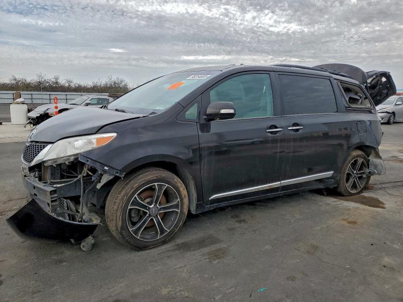 Photo 1 from auction – 2014 TOYOTA SIENNA XLE with VIN 5TDDK3DC2ES078561