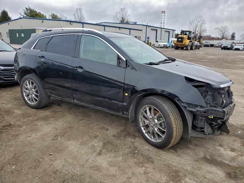 Photo 4 from auction – 2014 CADILLAC SRX PERFOR with VIN 3GYFNCE33ES685590