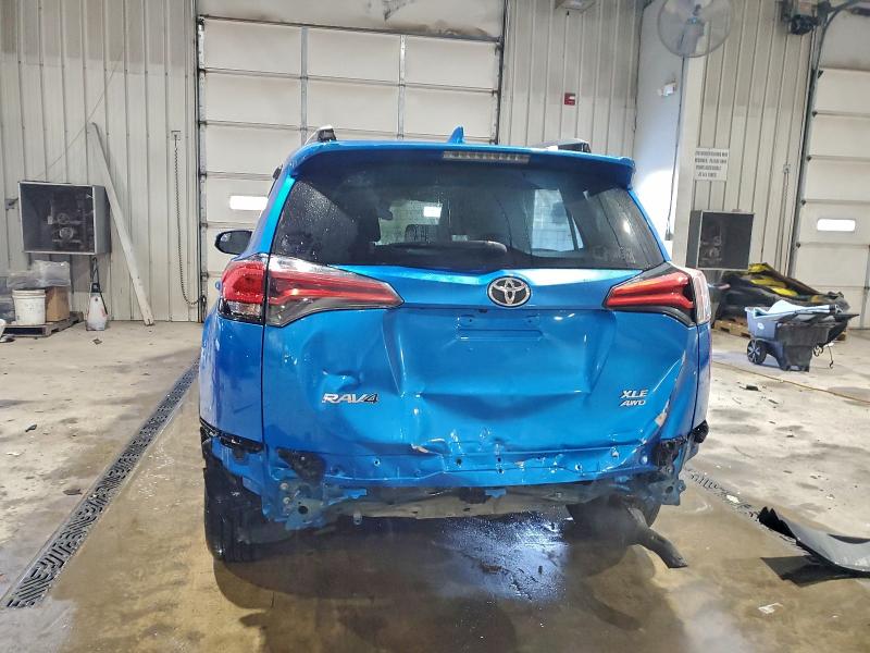 Photo 6 from auction – 2017 TOYOTA RAV4 XLE with VIN 2T3RFREVXHW612714