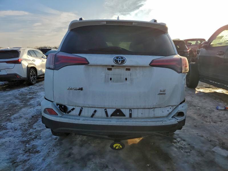 Photo 6 from auction – 2017 TOYOTA RAV4 LE with VIN JTMBFREVXHJ106784
