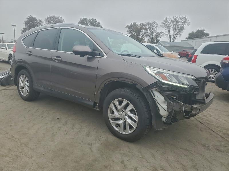 Photo 4 from auction – 2016 HONDA CR-V EXL with VIN 2HKRM3H76GH548855