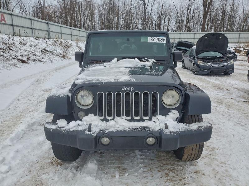Photo 5 from auction – 2016 JEEP WRANGLER U with VIN 1C4BJWEG8GL287353