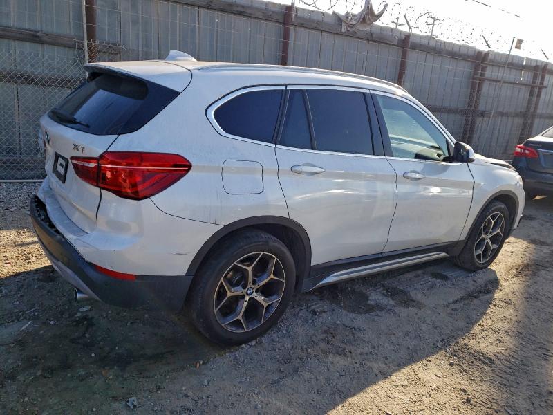 Photo 3 from auction – 2018 BMW X1 with VIN WBXHU7C32J5H40665