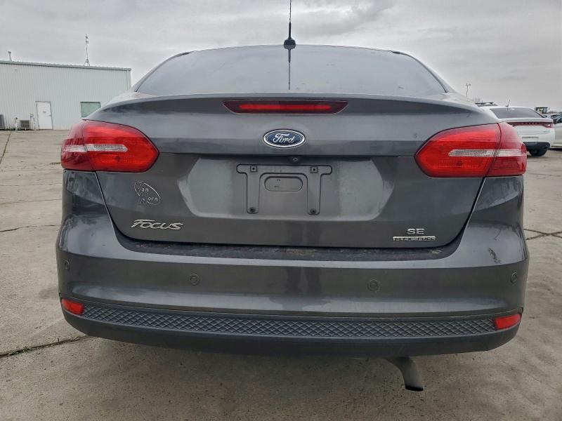 Photo 6 from auction – 2015 FORD FOCUS SE with VIN 1FADP3F20FL286579