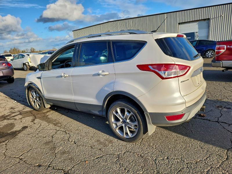 Photo 2 from auction – 2014 FORD ESCAPE TIT with VIN 1FMCU9J96EUB99957