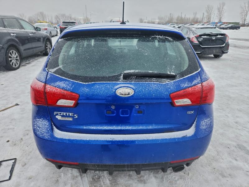 Photo 6 from auction – 2011 KIA FORTE with VIN KNAFW5A39B5456189