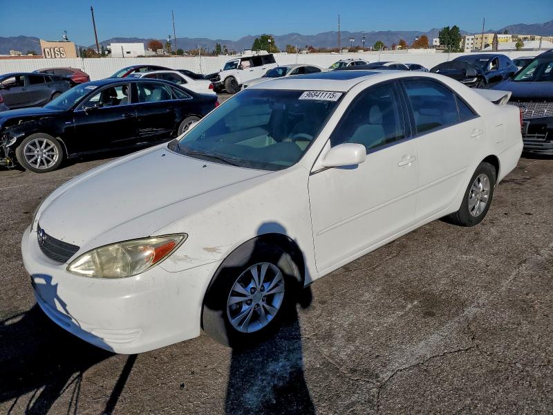 TOYOTA CAMRY LE 2004 with VIN 4T1BF32K84U072436 - Photo from auction