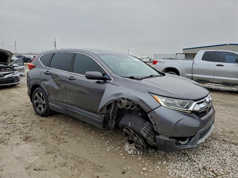 Photo 4 from auction – 2018 HONDA CR-V with VIN 5J6RW1H52JA003418