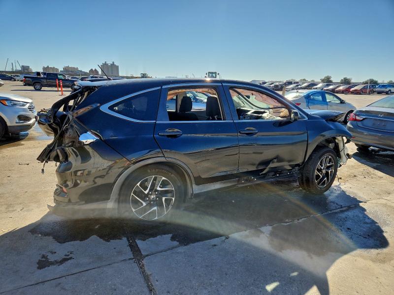 Photo 3 from auction – 2016 HONDA CR-V SE with VIN 2HKRM3H41GH553743
