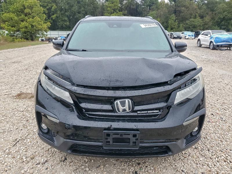 Photo 5 from auction – 2020 HONDA PILOT BLAC with VIN 5FNYF6H79LB014409