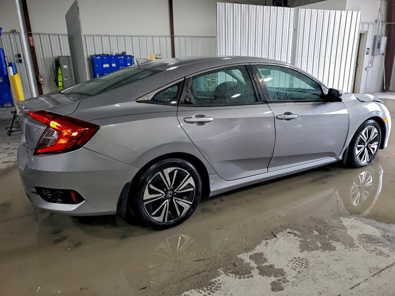 Photo 3 from auction – 2018 HONDA CIVIC EX with VIN 19XFC1F32JE002138