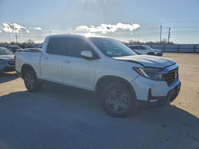 Photo 4 from auction – 2023 HONDA RIDGELINE with VIN 5FPYK3F73PB018899