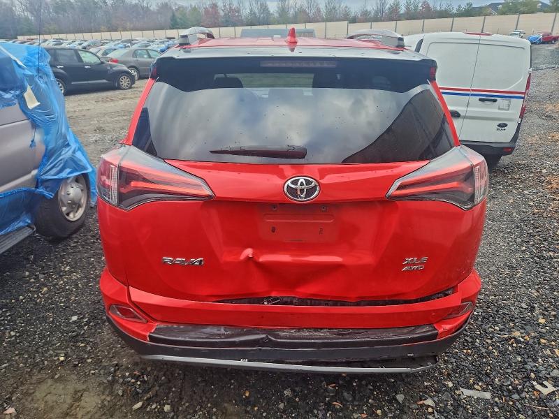 Photo 6 from auction – 2017 TOYOTA RAV4 XLE with VIN 2T3RFREV6HW663157