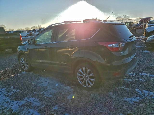 Photo 2 from auction – 2017 FORD ESCAPE with VIN 1FMCU9JD4HUD07730