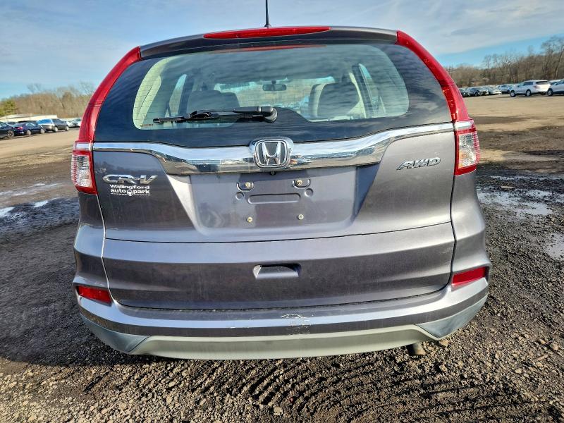 Photo 6 from auction – 2016 HONDA CR-V LX with VIN 2HKRM4H36GH644813