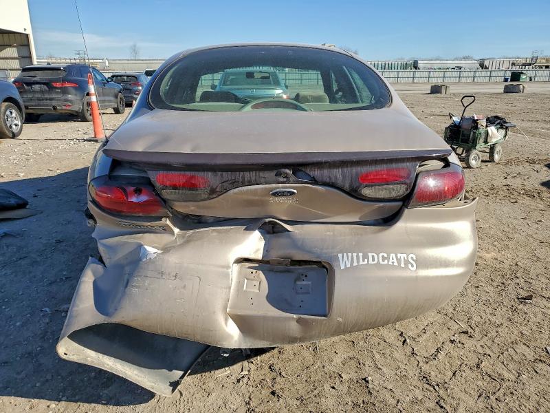 Photo 6 from auction – 1999 FORD TAURUS SE with VIN 1FAFP53S6XA327688
