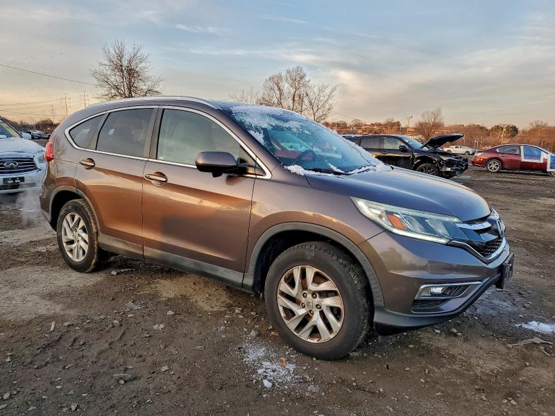 Photo 4 from auction – 2015 HONDA CR-V EXL with VIN 2HKRM4H71FH706278
