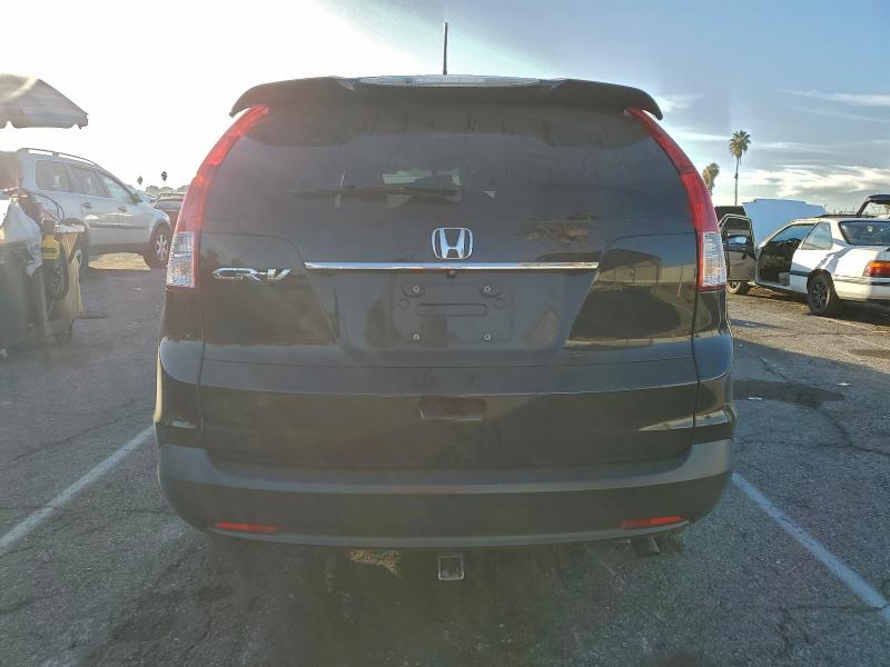 Photo 6 from auction – 2014 HONDA CR-V with VIN 2HKRM3H7XEH524815