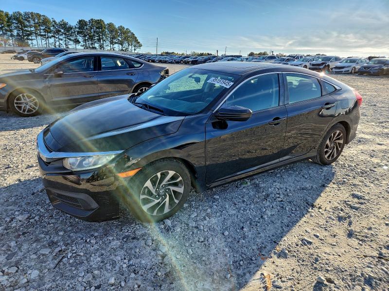 HONDA CIVIC EX 2017 with VIN 19XFC2F78HE024003 - Photo from auction