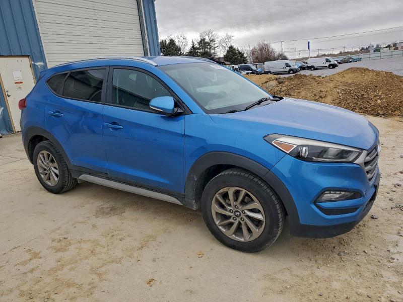 Photo 4 from auction – 2017 HYUNDAI TUCSON LIM with VIN KM8J3CA40HU414877
