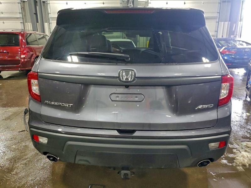 Photo 6 from auction – 2020 HONDA PASSPORT E with VIN 5FNYF8H55LB017561