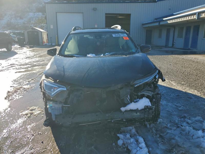 Photo 5 from auction – 2018 TOYOTA RAV4 LIMIT with VIN JTMDFREV4JJ239250