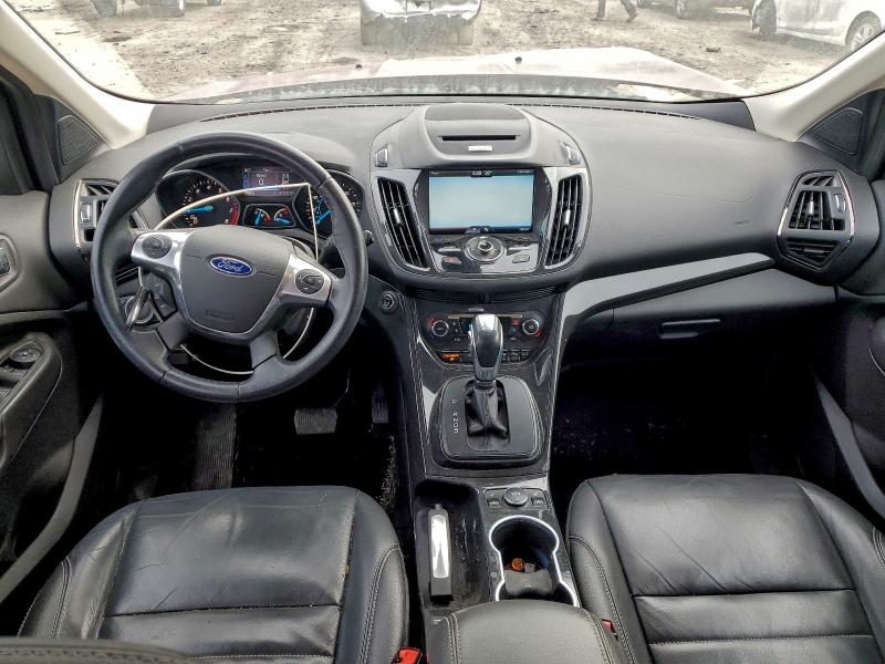 Foto 8 de la subasta – 2015 FORD ESCAPE con VIN 1FMCU0JX9FUB59688