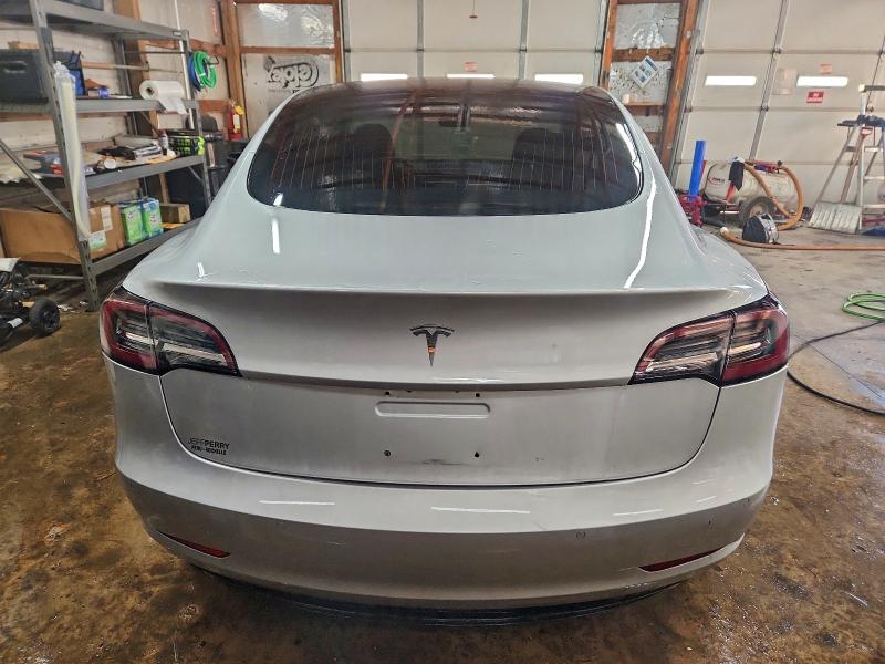 Photo 6 from auction – 2018 TESLA MODEL 3 with VIN 5YJ3E1EB6JF087663