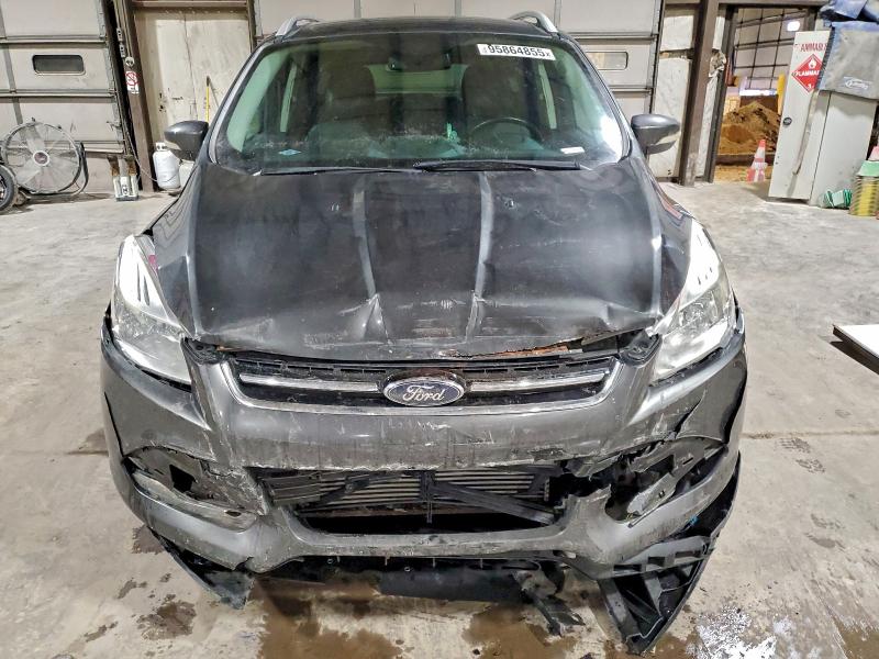 Photo 5 from auction – 2016 FORD ESCAPE TIT with VIN 1FMCU9JX1GUC86649