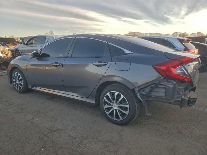 Photo 2 from auction – 2019 HONDA CIVIC LX with VIN 2HGFC2F69KH554565