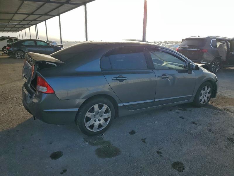 Photo 3 from auction – 2010 HONDA CIVIC LX with VIN 19XFA1F59AE064630