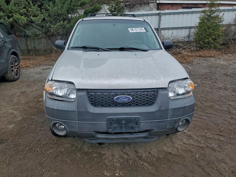 Photo 5 from auction – 2006 FORD ESCAPE HEV with VIN 1FMCU95H06KA31102
