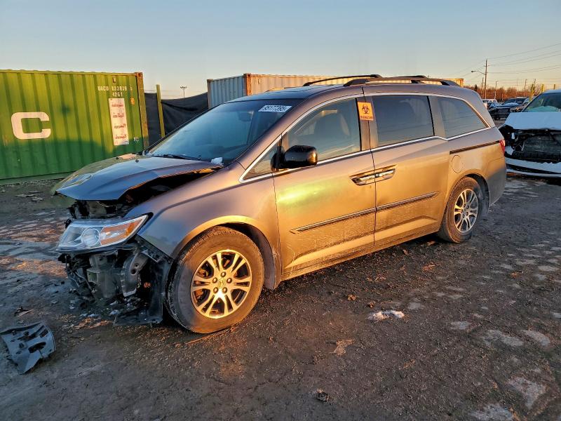HONDA ODYSSEY EX 2011 with VIN 5FNRL5H69BB094940 - Photo from auction
