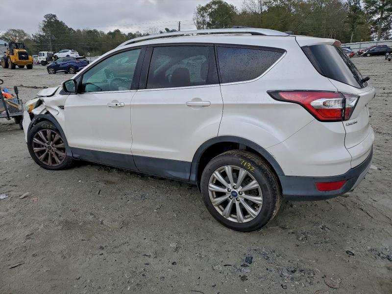 Photo 2 from auction – 2017 FORD ESCAPE TIT with VIN 1FMCU9JD8HUA56517