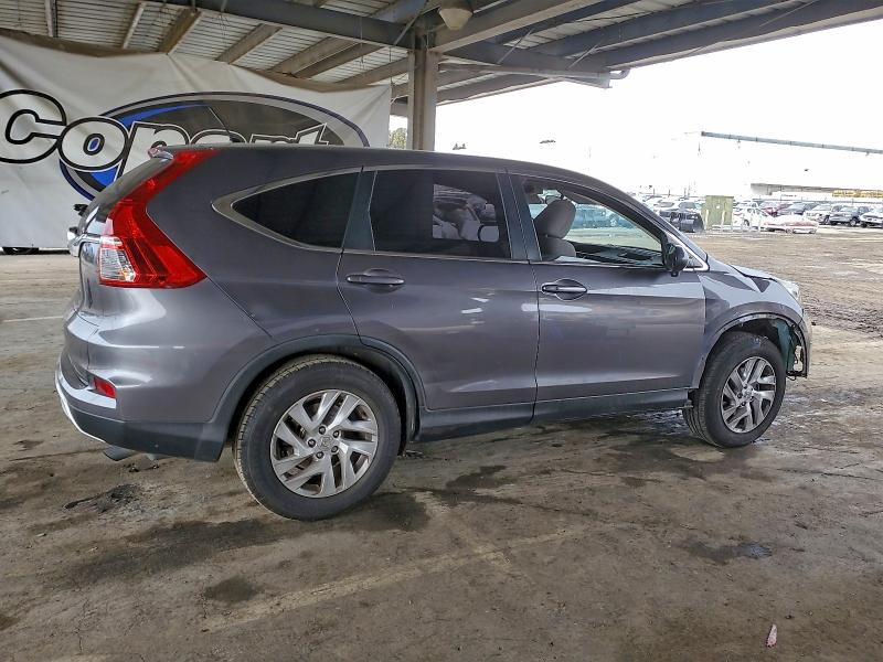 Photo 3 from auction – 2015 HONDA CR-V with VIN 2HKRM3H58FH535571