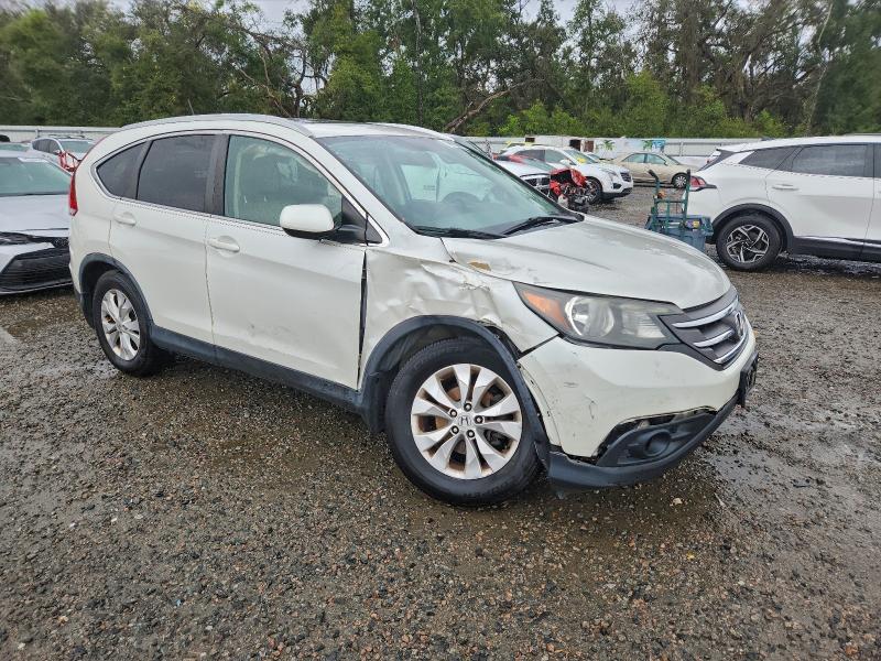 Photo 4 from auction – 2014 HONDA CR-V EXL with VIN 5J6RM4H78EL094133
