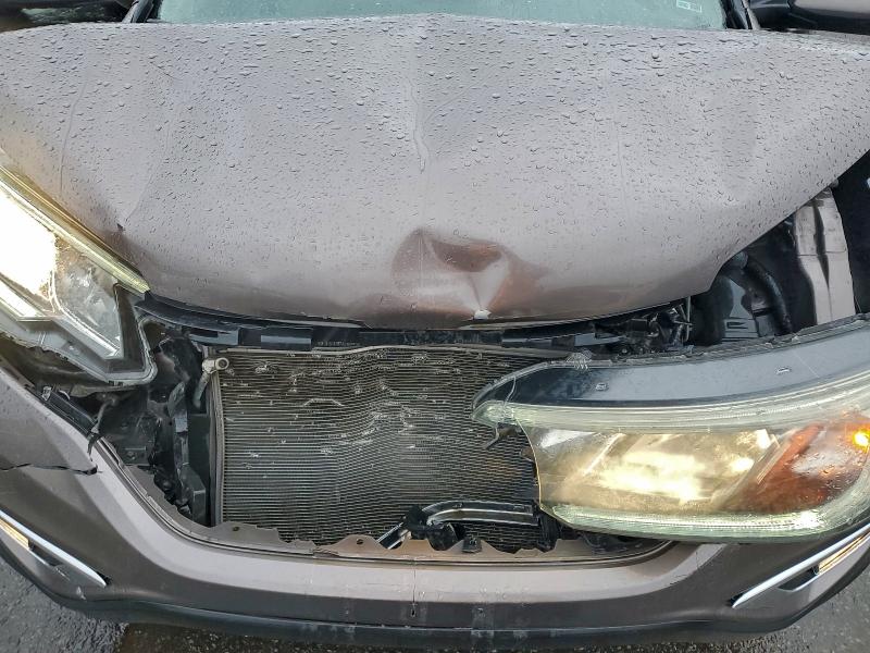 Photo 12 from auction – 2016 HONDA CR-V with VIN 2HKRM3H74GH502229
