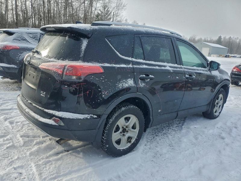 Photo 3 from auction – 2016 TOYOTA RAV4 XLE with VIN 2T3RFREV1GW528523
