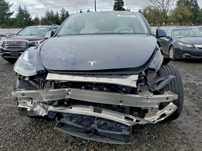 Photo 5 from auction – 2023 TESLA MODEL Y with VIN 7SAYGDEF3PF903180