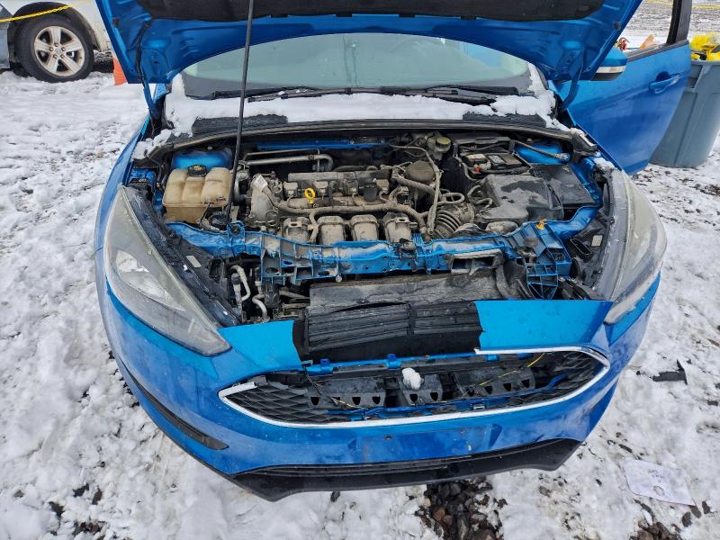 Photo 11 from auction – 2016 FORD FOCUS SE with VIN 1FADP3K29GL208891