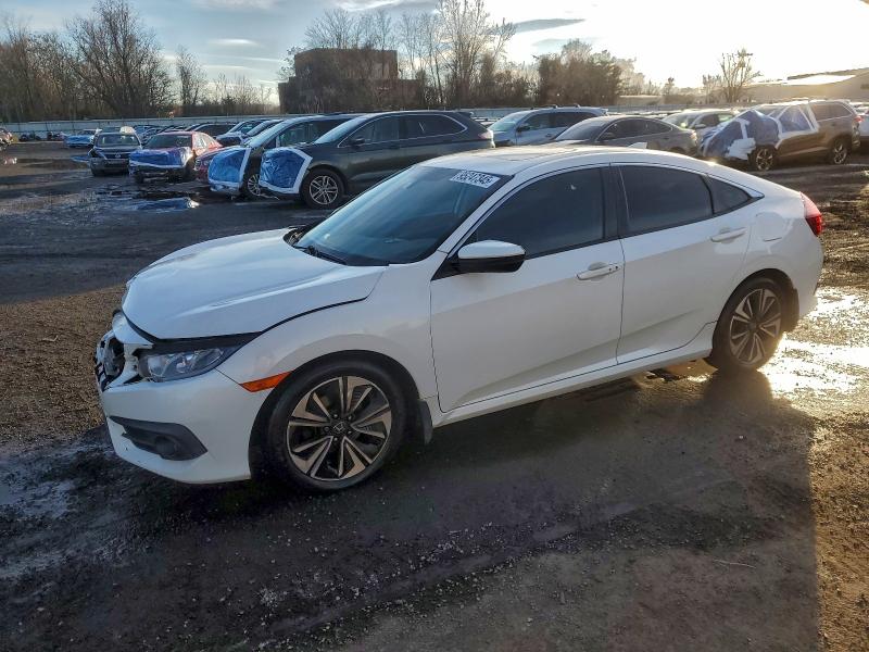 HONDA CIVIC 2016 with VIN 19XFC1F35GE205582 - Photo from auction