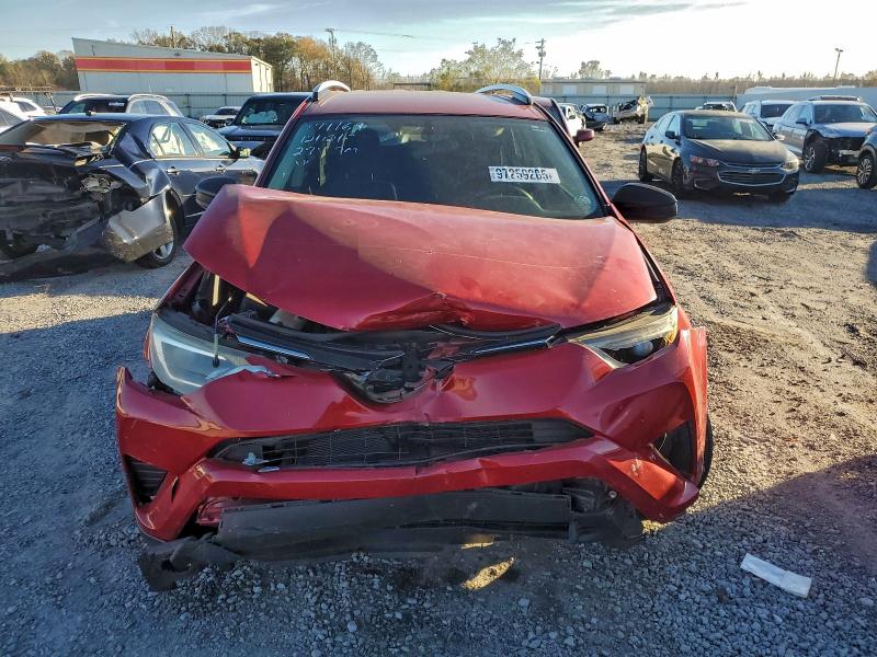 Photo 5 from auction – 2016 TOYOTA RAV4 LE with VIN JTMZFREV9GJ083656