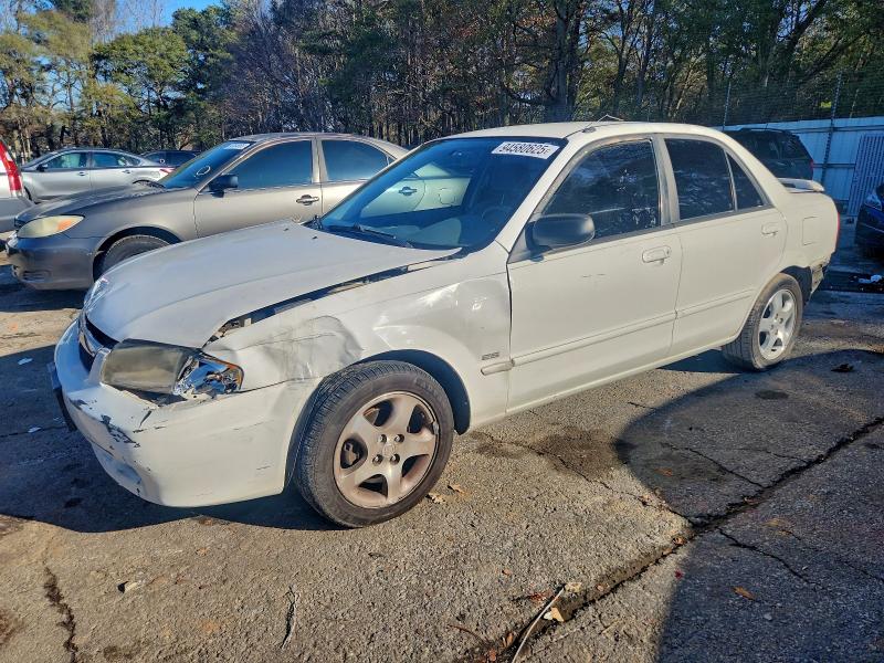 MAZDA PROTEGE ES 2000 with VIN JM1BJ2217Y0310407 - Photo from auction