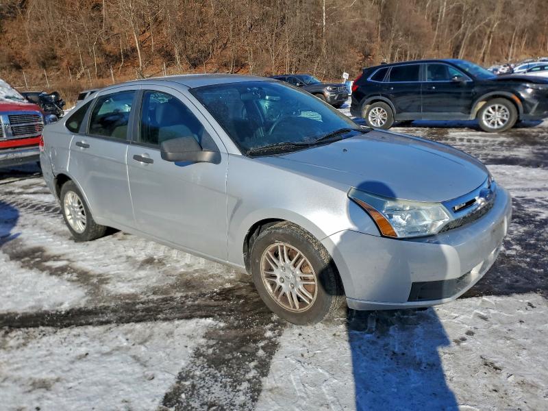 Photo 4 from auction – 2010 FORD FOCUS SE with VIN 1FAHP3FN7AW104623