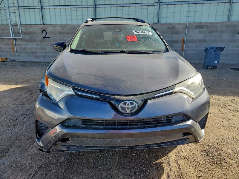 Photo 5 from auction – 2017 TOYOTA RAV4 LE with VIN JTMZFREV0HJ114147